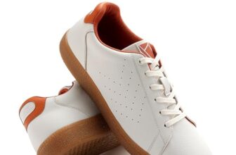 hummel Classic Pinnacle Casual Sneaker for Women Lightweight Breathable with Enhanced Comfort Cushioned Insole and Slip-Resistant Work and Play Casual Shoes- UK 3 White & Orange